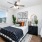 Guest bedroom with full size bed and walk-in closet