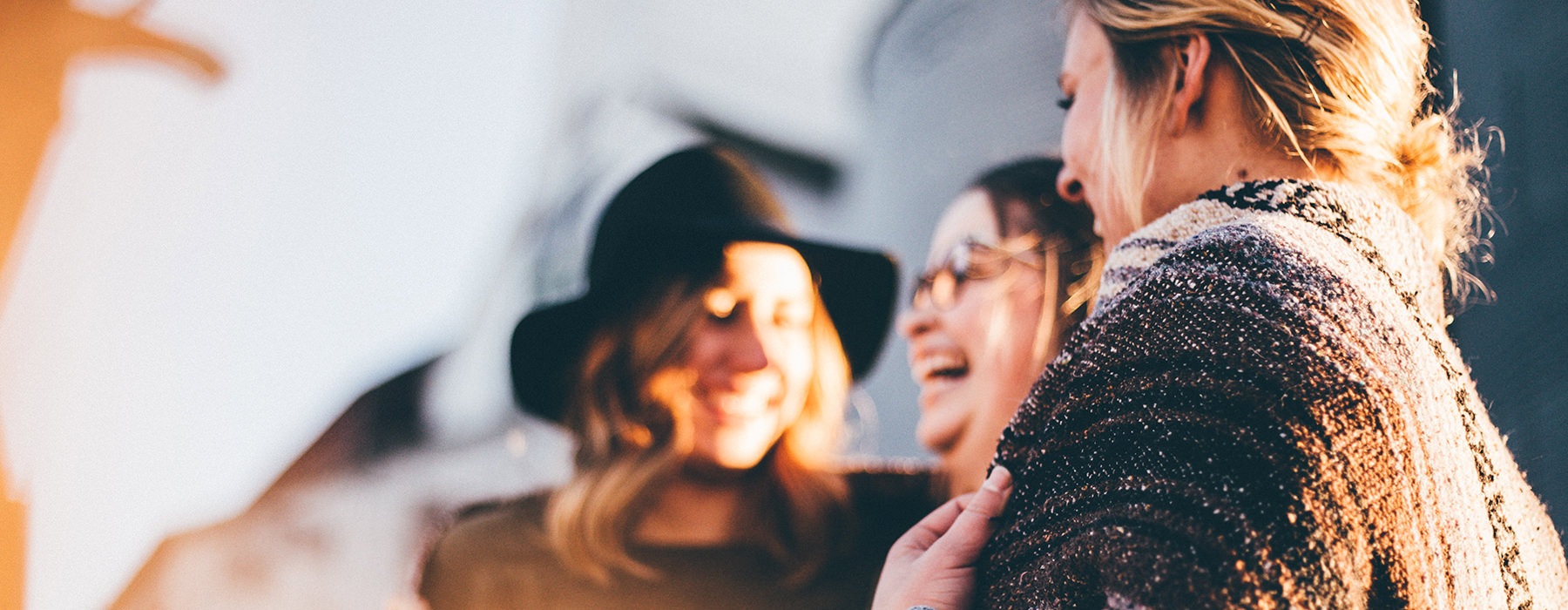 Group of friends hanging out laughing 